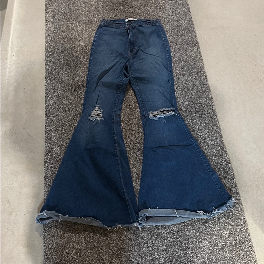 Vibrant Distressed Flare Jeans in Deep Blue